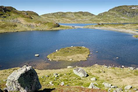 Scenic Lake in Green Valley Landscape · Free Stock Photo