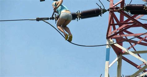 Woman hallucinating on drugs climbs electricity pylon thinking it was a bridge - World News ...