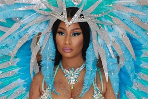 Nicki Minaj shows off her curves in sexy, colorful Carnival costume