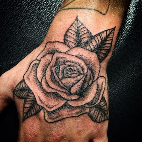 Rose Hand | Rose tattoos for men, Rose hand tattoo, Hand tattoos for guys