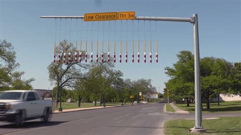 Height clearance curtains help trucks steer clear of low SA bridge with history of crashes ...