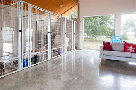 Chic indoor dog kennels in Modern Austin with Dog Door next to Dog Run alongside Dog Room and ...