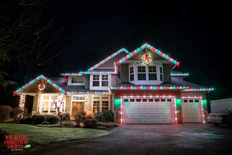 Green And White Christmas Lights On House - art-fidgety