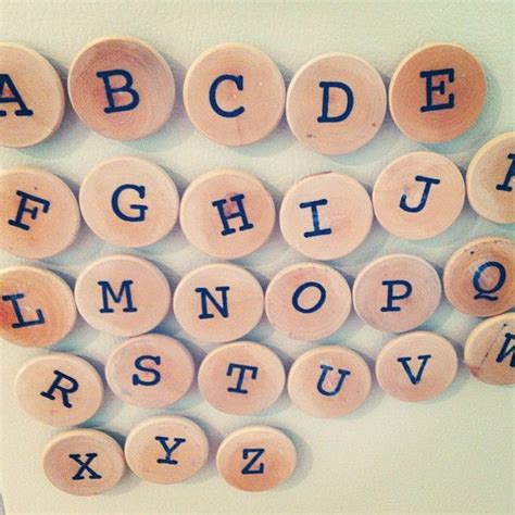 15 minute craft: DIY alphabet magnets -26 wooden discs [Michael's] -permanent marker or letter ...