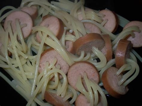 PUT THE UNCOOKED SPAGHETTI THROUGH THE HOTDOGS THEN BOIL UNTIL THE ...