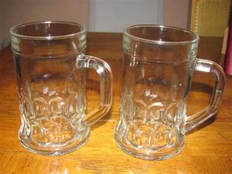 TWO VINTAGE CLEAR GLASS Beer MUGS/GLASSES -WITH HANDLES-IMPRINT AT BOTTOM-COKE - Manhattan