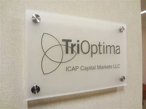 Frosted acrylic office sign mounted with stainless steel hardware in New York, NY. We specialize ...