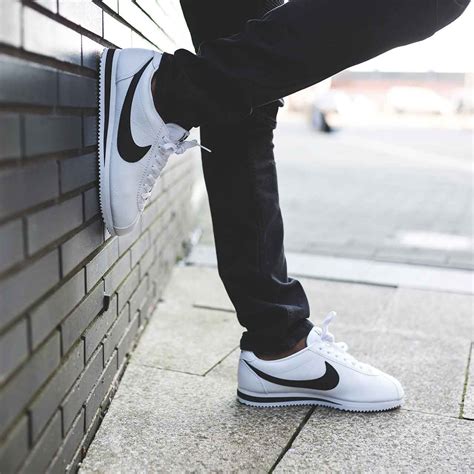 One of our favourite silhouettes this season, the Nike Cortez Leather Trainer in White & Black ...