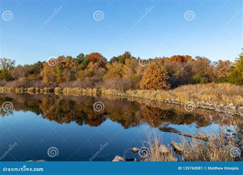 Fall Colors in a Park with Reflections in the Lake in Omaha Nebraska Stock Image - Image of fall ...