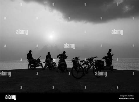 silhouette sunset background in beach shore Stock Photo - Alamy