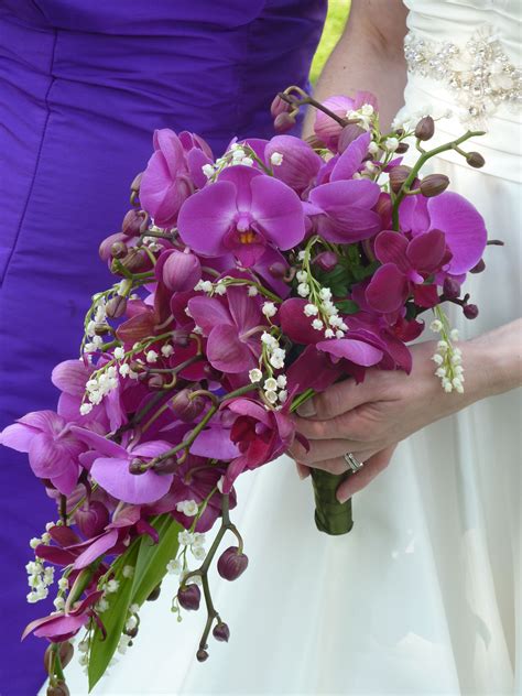 My wedding bouquet. Cascade of Phalaenopsis orchids and Lily of the valley | Lily bouquet ...