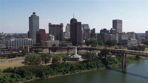 5.7K stock footage aerial video of office towers in the Downtown Memphis, Tennessee skyline seen ...