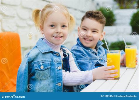 Kids Having Healthy Breakfast. Children Drinking Juices and Have Fun Stock Photo - Image of ...