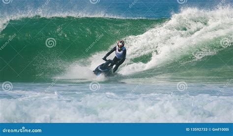 Jet ski in the waves editorial stock photo. Image of fast - 13592733