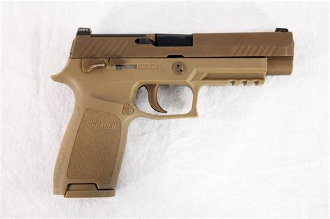 The Sig Sauer P-320 X-Carry: Super Gun or Paper Tiger? | The National ...