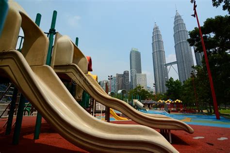 KLCC Park Playground and Petronas Twin Towers. Kuala Lumpur. Malaysia Editorial Photo - Image of ...