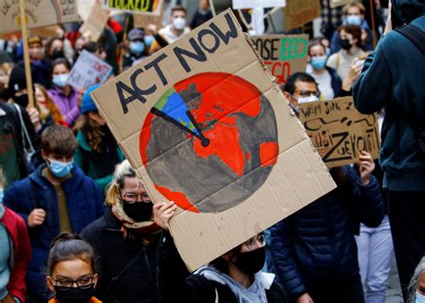 Campaigners stage climate protests across the world | PBS NewsHour