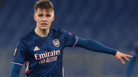 Martin Odegaard re-joins Arsenal from Real Madrid on a permanent ...