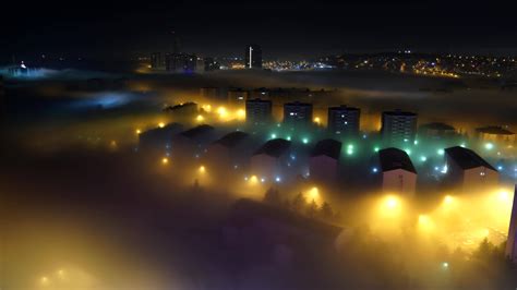 8K Fog Among Houses in City at Night 8082713 Stock Video at Vecteezy