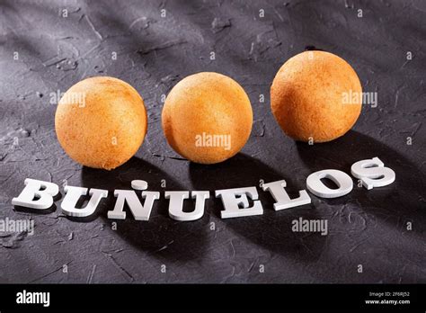 Traditional Colombian buñuelos (Deep Fried Cheese Bread) Text space Stock Photo - Alamy