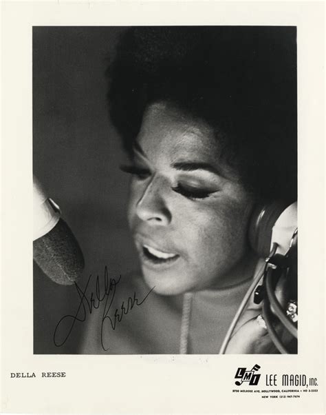 Della Reese Singing into Microphone