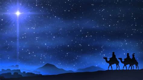 three wise men riding on camels in the desert under a star filled night sky