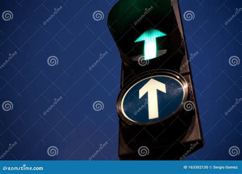 Green Traffic Light Arrow Close Up Stock Photo - Image of electronic ...