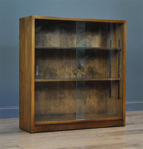 Pair Of Retro Low Glass Sliding Door Bookcase Cabinets, Herbert Gibbs & Pheonix – Witches Kist