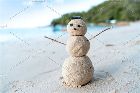 Snowman on the tropical beach | Sand snowman, Tropical beach, Snowman