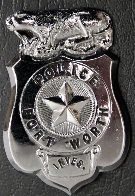 Aside from the FWPD larger breast uniform badge, officers get a smaller ...