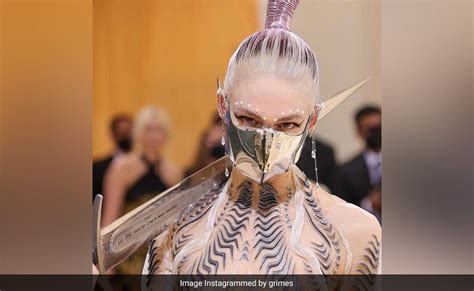 Singer Grimes Says AI Can Use Her Voice For Songs "Without Penalty" | Flipboard