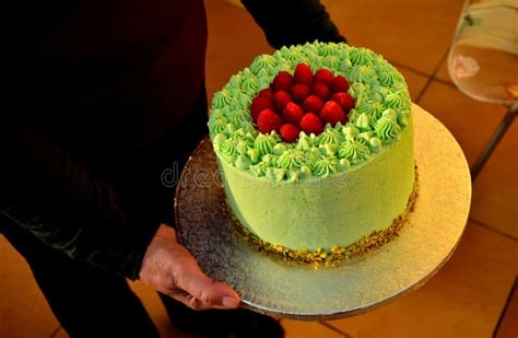 Family Celebration with Green Pistachio Cake Stock Image - Image of ...