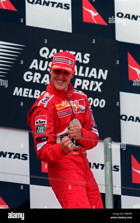 Michael Schumacher celebrates on the podium after winning the opening ...