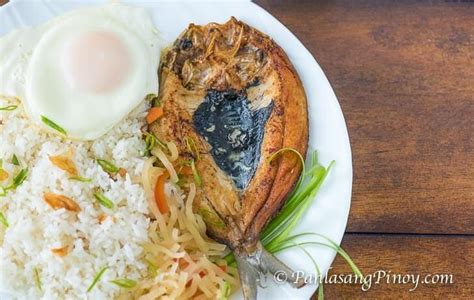 Fried Daing na Bangus with Garlic Fried Rice, Fried Egg, and Pickled Papaya (Daing Silog ...