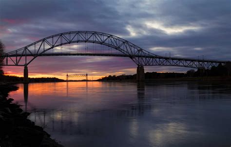 The Bourne Bridge at the Cape Cod Canal during sunset | Captain Farris ...