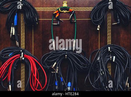 Cables Hanging On Wall Of Recording Studio Stock Photo - Alamy