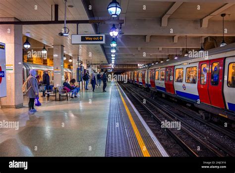 Railway train on Gloucester road station with passengers on platform ...