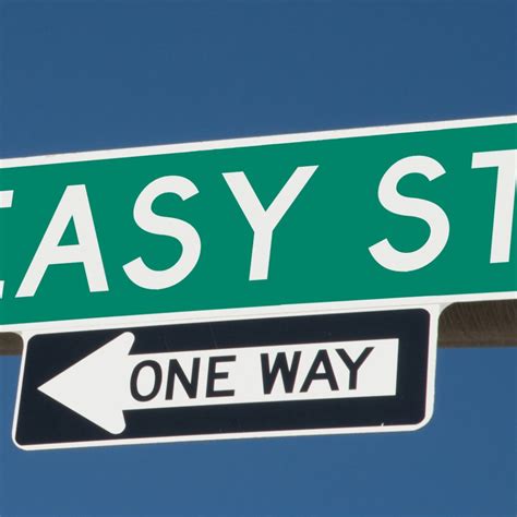 Easy Street on green overhead highway sign with one way arrow ...