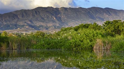 Golden hour sunset landscape on the lake, Montrouis, Haiti | Windows Spotlight Images