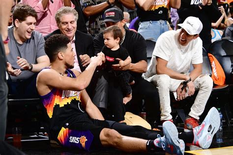 Devin Booker Adorably Fist Bumps a Baby During Phoenix Suns' NBA ...