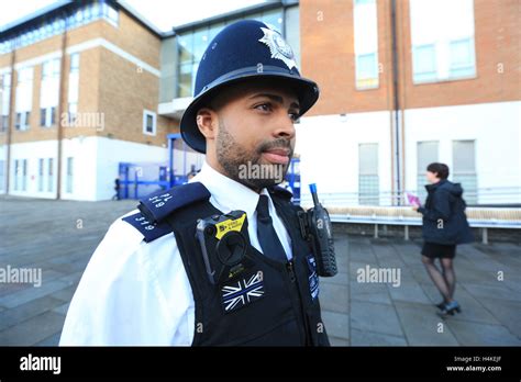 Police equipped with the new body worn video camera outside Lewisham police station, Lewisham ...