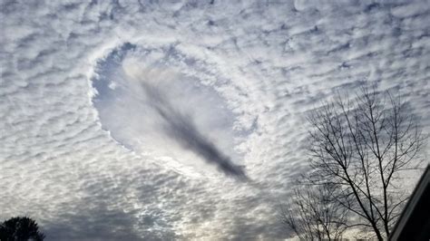 Is the truth out there? Rare hole punch cloud appears over Illinois in pictures - Strange Sounds