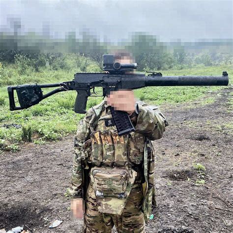 Ukrainian Army soldier with another trophy Russian special assault ...