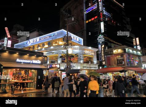 People visit Hongdae shopping street in Seoul South Korea. Hongdae is known for its urban arts ...