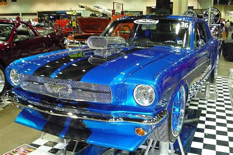 Ford mustang custom paint job | classic Mustang wearing an electric blue paint job and plenty of ...