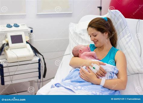 Young Mother Giving Birth To a Baby Stock Image - Image of girl, family: 66092129