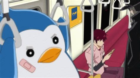 an animated penguin is sitting on the train