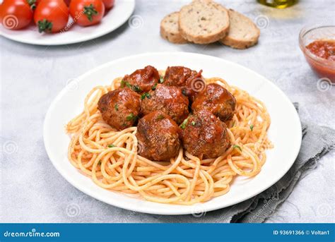 Meatballs in Tomato Sauce and Spaghetti Stock Photo - Image of meatballs, delicious: 93691366