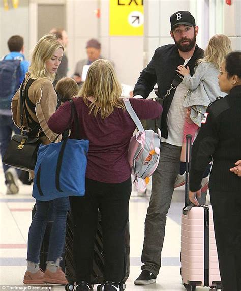 Emily Blunt and John Krasinski carry kids at JFK Airport | Daily Mail ...