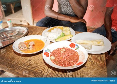 Traditional Ugandan Food Consisting of Goat Meat, Cassava, Potato, Beans, Maize Meal, Sweet ...